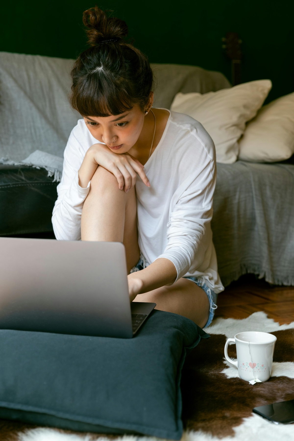 Person working on a laptop at home